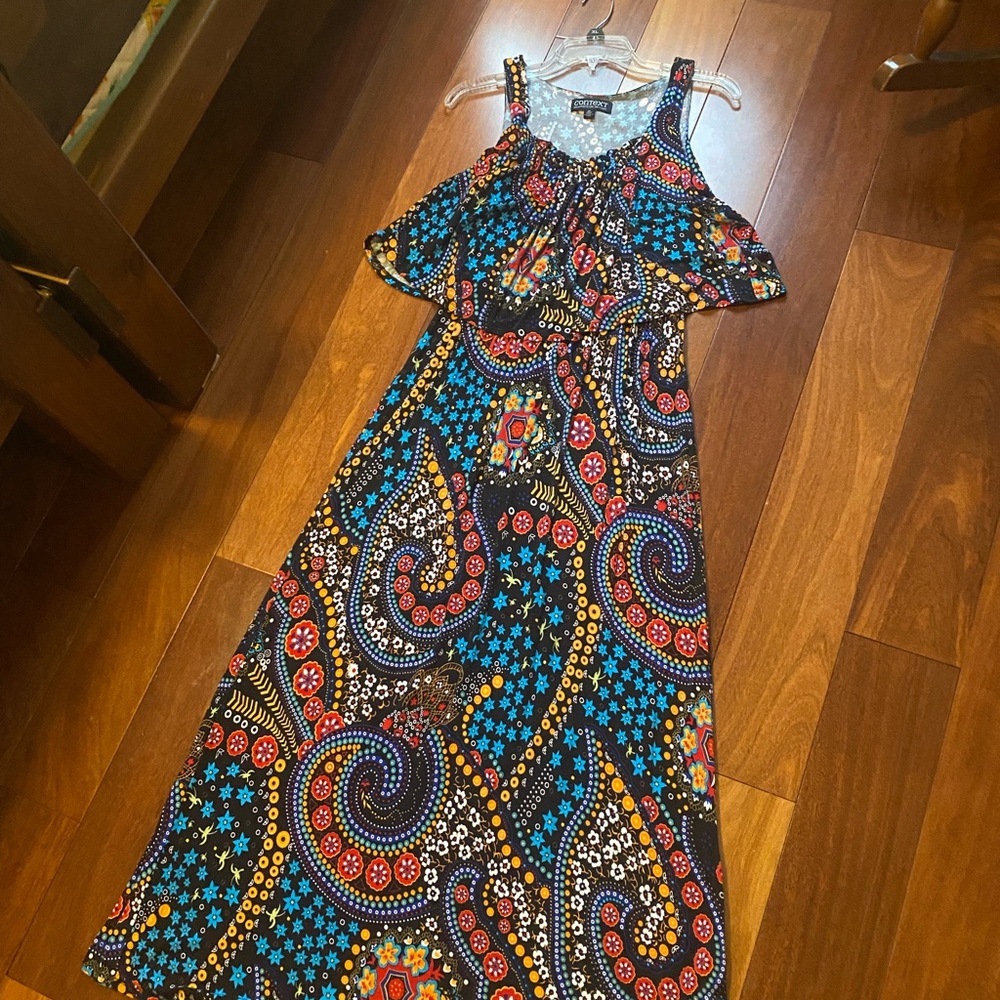 Context long dress with flirty bodice overlay. Perfect resort wear